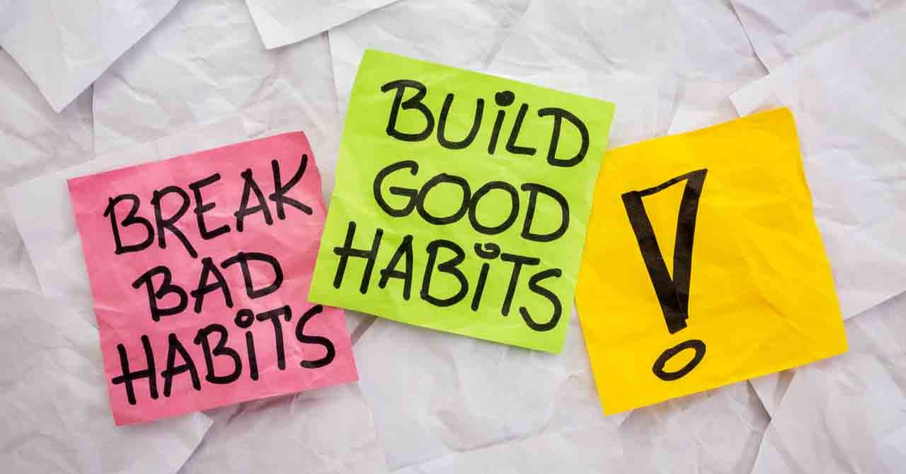 Three sticky notes with the words build good habits and bad habits.